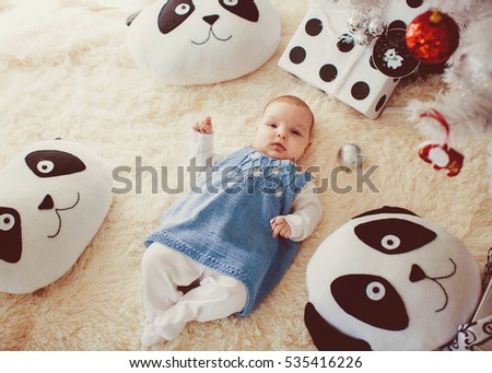 Incredible and charming newborn baby lying on blanket