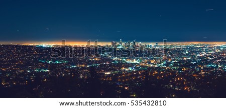 Los Angeles panoramic cityscape at night with view of downtown LA