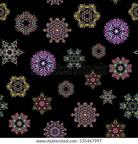 Seamless Repeating Pattern. Vector design. Christmas Stylized green, blue and neutral Snowflakes on a Black Background.