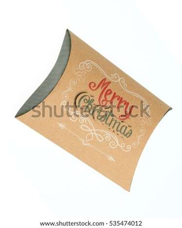 Beautiful cardboard christmas package, isolated on white background