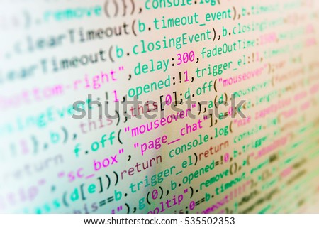 Software source code. Programming code abstract screen of software developer. Programming code typing. IT specialist workplace. Desktop PC monitor photo. Binary digits code editing. 
