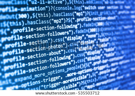 WWW software development. Webdesigner Workstation. Software source code. Website HTML Code on the Laptop Display Closeup Photo. Mobile app developer. Software development. 
