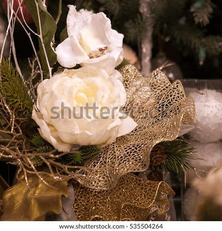 Winter Christmas floral arrangement, bouquet of berries, balls. Hoarfrost, glitter, glitter. New Year. Christmas tree.