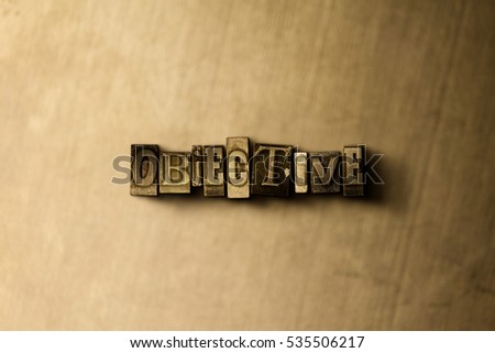 OBJECTIVE - close-up of grungy vintage typeset word on metal backdrop. Royalty free stock illustration.  Can be used for online banner ads and direct mail.