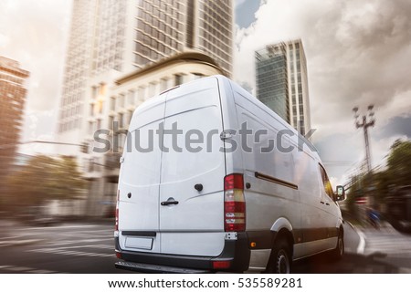 Delivery truck in a city Royalty-Free Stock Photo #535589281