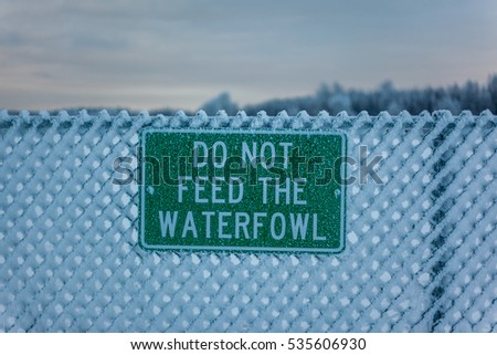 "Do not feed the waterfowl" sign at Lake Hood Seaplane Base in Anchorage, Alaska