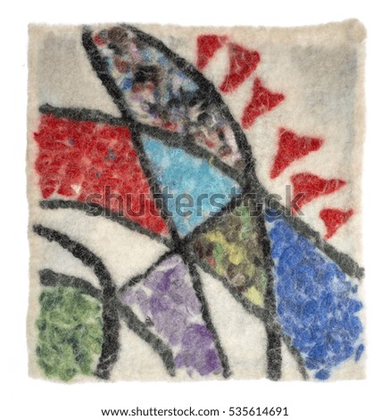 The mat of felted wool with an abstract pattern	