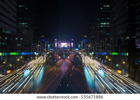 the light trails on the modern building background in thailand