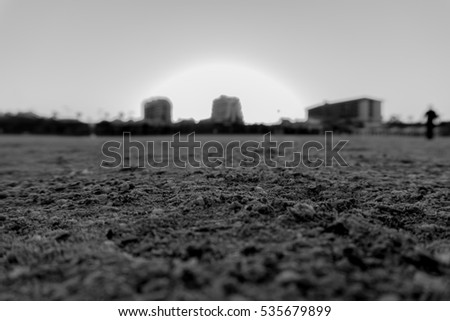 Raising of Herzliya's sun with building on background 