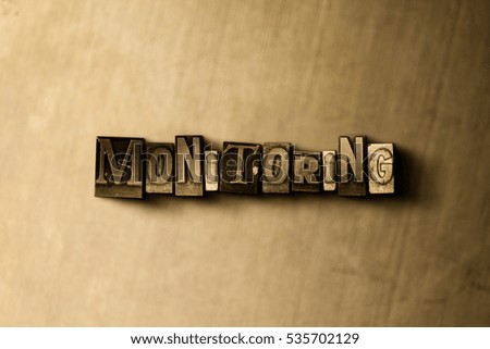 MONITORING - close-up of grungy vintage typeset word on metal backdrop. Royalty free stock illustration.  Can be used for online banner ads and direct mail.