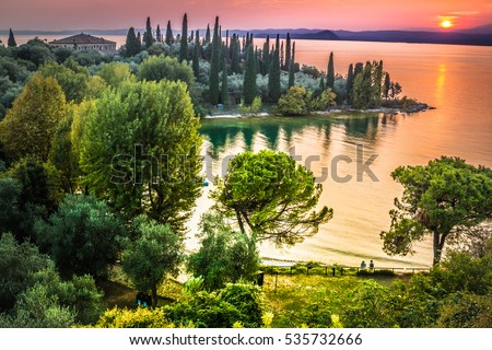 A beautiful sunset over the lake Garda. Italy.