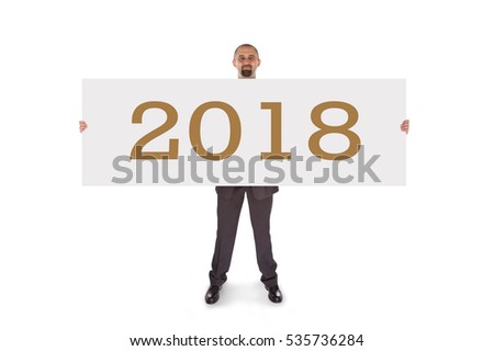 Smiling businessman holding a really big blank card - 2018, isolated on white
