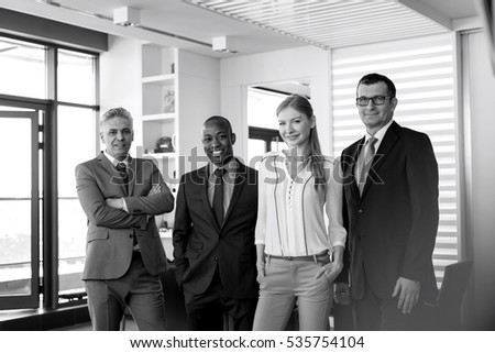 Portrait of confident multi-ethnic business people in office