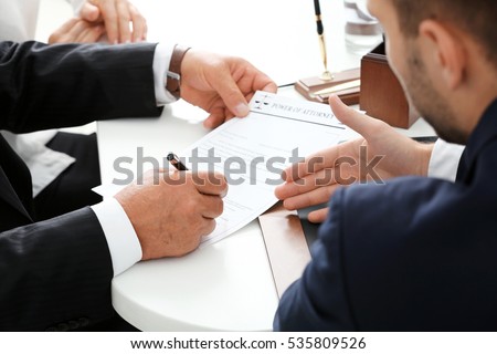 Notary with client in office Royalty-Free Stock Photo #535809526
