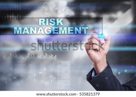 Businessman is drawing on virtual screen. risk management concept.