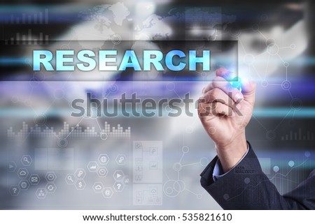 Businessman is drawing on virtual screen. research concept.