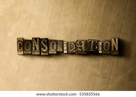 CONSOLIDATION - close-up of grungy vintage typeset word on metal backdrop. Royalty free stock illustration.  Can be used for online banner ads and direct mail.