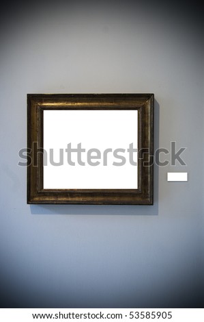 An aged frame on a white wall