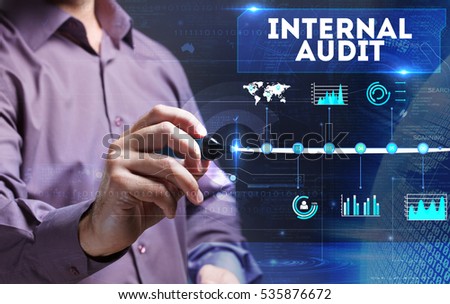 Technology, Internet, business and marketing. Young business person sees the word: internal audit
