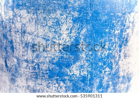 Abstract dirty textured walll. Painted  background bright blue color. Royalty-Free Stock Photo #535901311