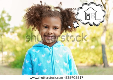 Cute little girl dreaming of home. Adoption, custody and childcare concept.