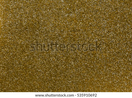 Abstract golden glitter texture and background
