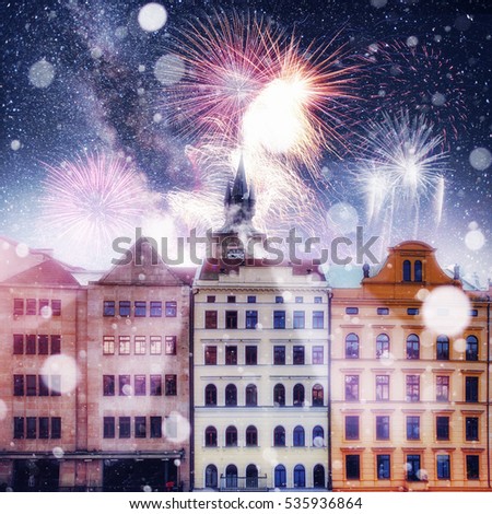 beautiful houses Czech Republic. Photo greeting card. Bokeh light effect, soft filter. Colorful fireworks on the black sky background