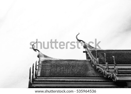 Roof style of Thai temple with gable apex on the top,black and white photography.