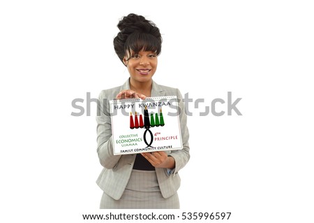 Happy Kwanzaa Collective Economics (Ujamaa) Calendar Seventh Principle Kinara Candle holder held by African American Business Woman looking at camera smiling isolated 
on white background