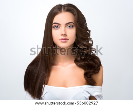 Hair befor after advertising. Hairstyle smooth and curly half-head  Royalty-Free Stock Photo #536002927