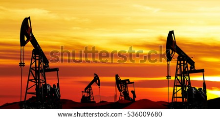 Oil pumps silhouette at colorful sunset