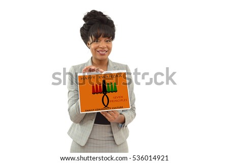 Happy Kwanzaa Calendar Seven Principles Kinara Candle holder 
held by African American Business Woman looking at camera smiling isolated 
on white background