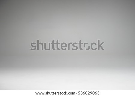 Grey and white gradient in studio wall for copyspace background