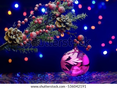 Christmas tree branch with decoration ball. Sparkling background. Fairy floor.