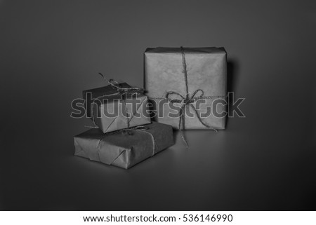Composition of Christmas gift boxes isolated on gray

