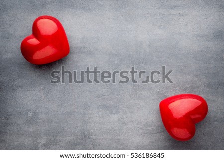 Red heart on the gray background