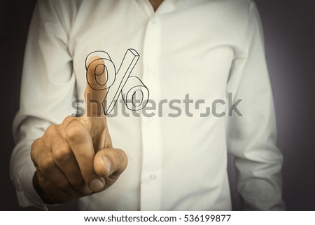 man holding hand on the percent sign