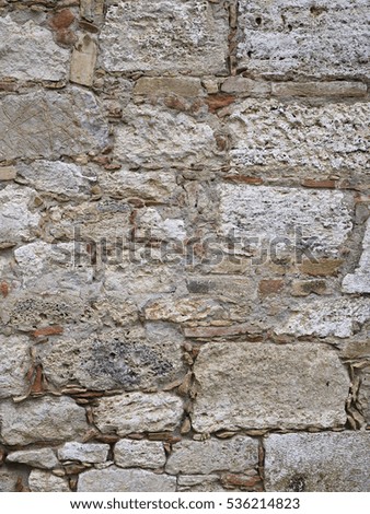 Centuries old stone wall background