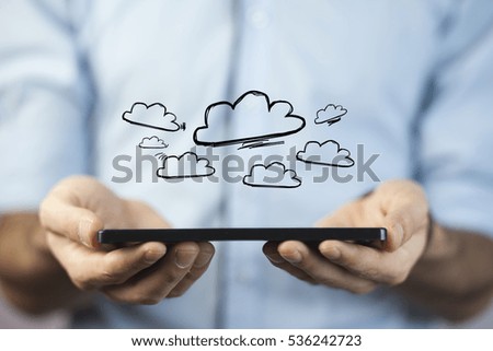 Concept view of cloud stockage with icon around a tablet