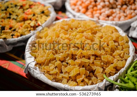 View of dried fruits and nuts in market. Various assortment natural colorful background