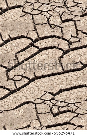 Texture, background, seamless pattern. This is useful for designers. a crack in the ground, drought, sun. absence of water. Slit narrow groove on the surface.