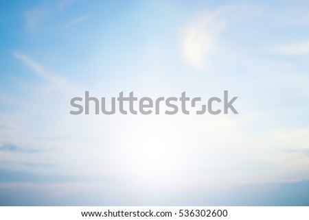 blurred sky clouds backgrounds with glowing flare lights.blurry background.blur backdrop concept.cooling pastel color cool tone:
