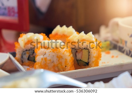 Sushi Roll - Maki Sushi made of Salmon, on plate. Japanese cuisine