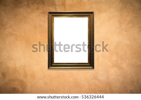 wooden picture frame on  old wall background