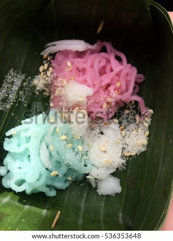 A type of Thai dessert which have many color such as blue or pink and sprinkle with sugar, coconut and white sesame seeds.