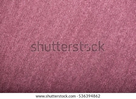 closeup of seamless pink knitted fabric texture used as background