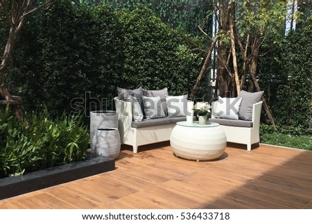 Outdoor furniture set in garden Royalty-Free Stock Photo #536433718