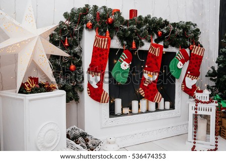 Beautiful decorated fireplace and Christmas tree at cottage