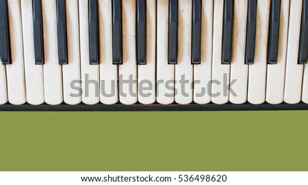 Piano keyboard, black and white keys close-up, vintage