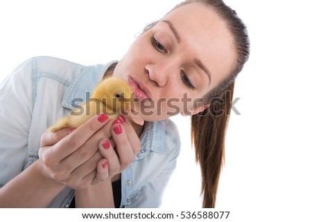 young woman with yellow duck on a white background